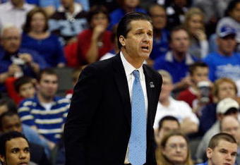 KANSAS CITY, MO - MARCH 21:  Head Coach John Calipari of the Memphis Tigers looks on from the sideline during their second round game against the Maryland Terrapins in the NCAA Division I Men's Basketball Tournament at the Sprint Center on March 21, 2009 in Kansas City, Missouri. The Tigers defeated the Terrapins 89-70.  (Photo by Jamie Squire/Getty Images)