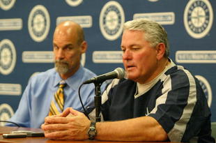 SEATTLE - JULY 01:  Manager Mike Hargrove #21 of the Seattle Mariners announces his resignation as General Manager Bill Bavasi looks on prior to a game against the Toronto Blue Jays July 1, 2007 at Safeco Field in Seattle, Washington. Bench coach John McLaren takes over from Hargrove.  (Photo by Otto Greule Jr/Getty Images)