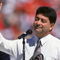 SAN FRANCISCO - SEPTEMBER 10:  San Francisco 49ers owner Eddie Debartolo speaks to the fans during the 49ers home opener against the Atlanta Falcons at Candlestick Park on September 10, 1995 in San Francisco, California.  The 49ers won 41-10.  (Photo by George Rose/Getty Images)