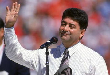 SAN FRANCISCO - SEPTEMBER 10:  San Francisco 49ers owner Eddie Debartolo speaks to the fans during the 49ers home opener against the Atlanta Falcons at Candlestick Park on September 10, 1995 in San Francisco, California.  The 49ers won 41-10.  (Photo by George Rose/Getty Images)
