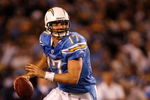 SAN DIEGO - JANUARY 03:  Philip Rivers #17 of the San Diego Chargers drops back to pass against the Indianapolis Colts during their AFC Wild Card Game on January 3, 2009 at Qualcomm Stadium in San Diego, California. The Chargers defeated the Colts 23-17 in overtime. (Photo by Harry How/Getty Images)