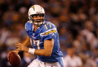 SAN DIEGO - JANUARY 03:  Philip Rivers #17 of the San Diego Chargers drops back to pass against the Indianapolis Colts during their AFC Wild Card Game on January 3, 2009 at Qualcomm Stadium in San Diego, California. The Chargers defeated the Colts 23-17 in overtime. (Photo by Harry How/Getty Images)