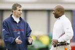ORCHARD PARK, NY - MAY 6:  Head coach Dick Jauron of the Buffalo Bills talks to defensive coordinator Perry Fewell during Mini Camp on May 6, 2006 at the Buffalo Bills Fieldhouse in Orchard Park, New York. (Photo by Rick Stewart/Getty Images)