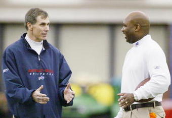 ORCHARD PARK, NY - MAY 6:  Head coach Dick Jauron of the Buffalo Bills talks to defensive coordinator Perry Fewell during Mini Camp on May 6, 2006 at the Buffalo Bills Fieldhouse in Orchard Park, New York. (Photo by Rick Stewart/Getty Images)