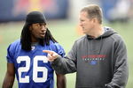 EAST RUTHERFORD, NJ - MAY 09:  Defensive coordinator Bill Sheridan and DeAndre Wright #26 of the New York Giants work out at rookie camp on May 9, 2009 in East Rutherford, New Jersey.  (Photo by Jeff Zelevansky/Getty Images)