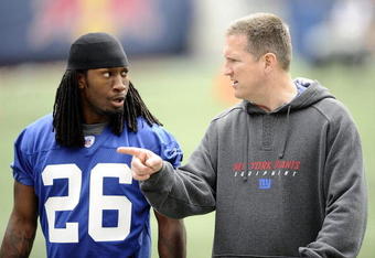 EAST RUTHERFORD, NJ - MAY 09:  Defensive coordinator Bill Sheridan and DeAndre Wright #26 of the New York Giants work out at rookie camp on May 9, 2009 in East Rutherford, New Jersey.  (Photo by Jeff Zelevansky/Getty Images)