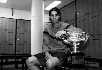 MELBOURNE, AUSTRALIA - FEBRUARY 01:  (EDITORS NOTE: THIS BLACK AND WHITE IMAGE HAS BEEN CONVERTED FROM ORIGINAL COLOUR FILE) Rafael Nadal of Spain poses with the Norman Brookes Challenge Cup in the players locker room after winning the men's final match against Roger Federer of Switzerland during day fourteen of the 2009 Australian Open at Melbourne Park on  February 1, 2009 in Melbourne, Australia.  (Photo by Clive Brunskill/Getty Images)