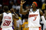 CHARLOTTE, NC - MARCH 31:  Gerald Wallace #3 and Raymond Felton #20 of the Charlotte Bobcats react after a play during their game against the Los Angeles Lakers at Time Warner Cable Arena on March 31, 2009 in Charlotte, North Carolina.  NOTE TO USER: User expressly acknowledges and agrees that, by downloading and/or using this Photograph, user is consenting to the terms and conditions of the Getty Images License Agreement.  (Photo by Streeter Lecka/Getty Images)