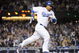 LOS ANGELES, CA - APRIL 30: Manny Ramirez #99 of the Los Angeles Dodgers hits a homerun for a 4-3 lead against the San Diego Padres during the third inning at Dodger Stadium on April 30, 2009 in Los Angeles, California. (Photo by Harry How/Getty Images)