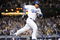LOS ANGELES, CA - APRIL 30:  Manny Ramirez #99 of the Los Angeles Dodgers hits a homerun for a 4-3 lead against the San Diego Padres during the third inning at Dodger Stadium on April 30, 2009 in Los Angeles, California.  (Photo by Harry How/Getty Images)