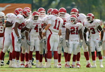 AUSTIN, TX - SEPTEMBER 27:  Quarterback Casey Dick #11 of the Arkansas Razorbacks leads the huddle during the game against the Texas Longhorns on September 27, 2008 at Darrell K Royal-Texas Memorial Stadium in Austin, Texas.  Texas won 52-10.  (Photo by Brian Bahr/Getty Images)