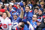 NEW YORK - FEBRUARY 05:  New York Giants fans cheer the players as they pass in floats along Broadway, also known as 'The Canyon of Heroes' during Super Bowl XLII victory parade in New York City.  (Photo by Al Bello/Getty Images)