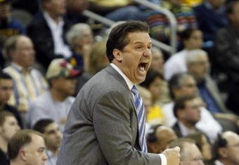 KANSAS CITY, MO - MARCH 19:  Head Coach John Calipari of the Memphis Tigers yells at his players as they run back on defense in the second half during their first round game against the CSUN Matadors in the first half of the NCAA Division I Men's Basketball Tournament at the Sprint Center on March 19, 2009 in Kansas City, Missouri. The Tigers defeated the Matadors 81-70. (Photo by Jamie Squire/Getty Images)