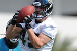 JACKSONVILLE, FL - MAY 1:  Tight end Zach Miller #49 of the Jacksonville Jaguars grabs a pass during a team mini-camp on May 1, 2009 on the practice fields at Jacksonville Municipal Stadium in Jacksonville, Florida.  (Photo by Al Messerschmidt/Getty Images)