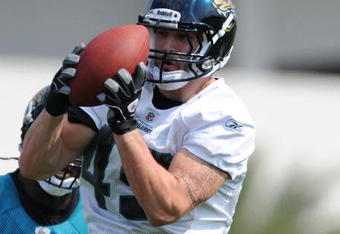 JACKSONVILLE, FL - MAY 1:  Tight end Zach Miller #49 of the Jacksonville Jaguars grabs a pass during a team mini-camp on May 1, 2009 on the practice fields at Jacksonville Municipal Stadium in Jacksonville, Florida.  (Photo by Al Messerschmidt/Getty Images)