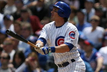 CHICAGO - MAY 02: Ryan Theriot #2 of the Chicago Cubs hits a triple in the 2nd inning against the Florida Marlins on May 2, 2009 at Wrigley Field in Chicago, Illinois. The Cubs defeatewdf the Marlins 6-1. (Photo by Jonathan Daniel/Getty Images)