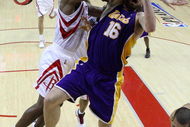 HOUSTON - MAY 08: Guard Ron Artest #96 of the Houston Rockets commits a flagrant foul on Pau Gasol #16 of the Los Angeles Lakers in Game Three of the Western Conference Semifinals during the 2009 NBA Playoffs at Toyota Center on May 8, 2009 in Houston, Texas. NOTE TO USER: User expressly acknowledges and agrees that, by downloading and or using this photograph, User is consenting to the terms and conditions of the Getty Images License Agreement. (Photo by Ronald Martinez/Getty Images)