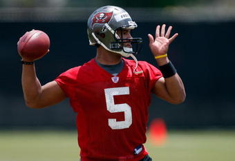 TAMPA - MAY 01:  Quarterback Josh Freeman #5 of the Tampa Bay Buccaneers throws a pass during the Buccaneers Rookie Minicamp at One Buccaneer Place on May 1, 2009 in Tampa, Florida.  (Photo by J. Meric/Getty Images)
