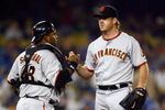 LOS ANGELES, CA - MAY 08:  Pitcher Brian Wilson (L) #38 of the San Francisco Giants is congratulated by catcher Pablo Sandoval #48 after saving the game against the Los Angeles Dodgers at Dodger Stadium on May 8, 2009 in Los Angeles, California. The Giants defeated the Dodgers 3-1.  (Photo by Jeff Gross/Getty Images)