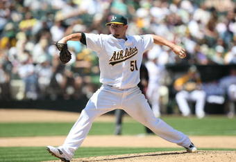 OAKLAND, CA - MAY 10:  Dallas Braden #51 of the Oakland Athletics pitches against the Toronto Blue Jays during a Major League Baseball game on May 10, 2009 at the Oakland Coliseum in Oakland, California.  (Photo by Jed Jacobsohn/Getty Images)