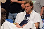 DENVER - MAY 13:  Dirk Nowitzki #41 of the Dallas Mavericks sits on the bench late in the game against  the Denver Nuggets in Game Five of the Western Conference Semifinals during the 2009 NBA Playoffs at Pepsi Center on May 13, 2009 in Denver, Colorado. The Nuggets defeated the Mavericks 124-110 to advance to the Western Conference Finals. NOTE TO USER: User expressly acknowledges and agrees that, by downloading and or using this photograph, User is consenting to the terms and conditions of the Getty Images License Agreement.  (Photo by Doug Pensinger/Getty Images)