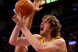 LOS ANGELES, CA - MAY 12:  Pau Gasol #16 of the Los Angeles Lakers goes up for a shot over Brian Cook #43 of the Houston Rockets in the first half of Game Five of the Western Conference Semifinals during the 2009 NBA Playoffs at Staples Center on May 12, 2009 in Los Angeles, California. NOTE TO USER: User expressly acknowledges and agrees that, by downloading and or using this photograph, User is consenting to the terms and conditions of the Getty Images License Agreement.  (Photo by Stephen Dunn/Getty Images)