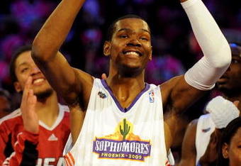 PHOENIX - FEBRUARY 13:  Kevin Durant #35 of the Sophomore team holds up the MVP trophy after the Sophomores won the T-Mobile Rookie Challenge & Youth Jam part of 2009 NBA All-Star Weekend at US Airways Center on February 13, 2009 in Phoenix, Arizona.  NOTE TO USER: User expressly acknowledges and agrees that, by downloading and or using this photograph, User is consenting to the terms and conditions of the Getty Images License Agreement.  (Photo by Ronald Martinez/Getty Images)