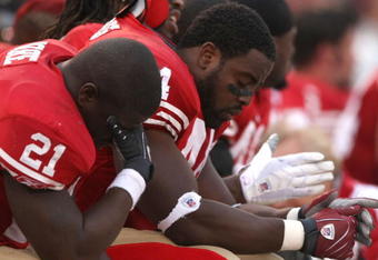 SAN FRANCISCO - NOVEMBER 18:  Frank Gore #21 and Moran Norris #44 of the San Francisco 49ers sit on the bench in the fourth quarter against the St. Louis Rams at Monster Park November 18, 2007 in San Francisco, California.  (Photo by Jed Jacobsohn/Getty Images)