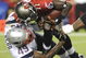 TAMPA, FL - AUGUST 17: Quarterback Josh Johnson #11 of the Tampa Bay Buccaneers is sacked by linebacker Vince Redd #49 of the New England Patriots at Raymond James Stadium on August 17, 2008 in Tampa, Florida. (Photo by Al Messerschmidt/Getty Images)