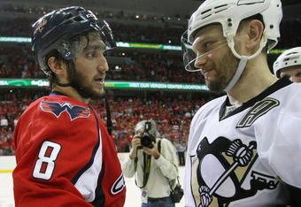 WASHINGTON - MAY 13: Alex Ovechkin #8 of the Washington Capitals and Sergei Gonchar #55 of the Pittsburgh Penguins shake hands after Pittsburgh's 6-2 victory in Game Seven of the Eastern Conference Semifinal Round of the 2009 Stanley Cup Playoffs at Verizon Center May 13, 2009 in Washington, DC.  (Photo by Bruce Bennett/Getty Images)