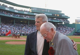 BOSTON - JULY 22:  Baseball greats Dom DiMaggio (R) and Johnny Pesky (L) attend the Ted Williams tribute on July 22, 2002 at Fenway Park in Boston, Massachusetts. The public was invited to the park to honor Williams who died July 5, 2002. (Photo by Darren McCollester/Getty Images)  