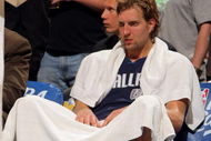 DENVER - MAY 13:  Dirk Nowitzki #41 of the Dallas Mavericks sits on the bench late in the game against  the Denver Nuggets in Game Five of the Western Conference Semifinals during the 2009 NBA Playoffs at Pepsi Center on May 13, 2009 in Denver, Colorado. The Nuggets defeated the Mavericks 124-110 to advance to the Western Conference Finals. NOTE TO USER: User expressly acknowledges and agrees that, by downloading and or using this photograph, User is consenting to the terms and conditions of the Getty Images License Agreement.  (Photo by Doug Pensinger/Getty Images)