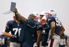 FOXBORO, MA - JULY 24:  Defensive Line Coach Pepper Johnson of the New England Patriots provides instruction in a drill during the first day of training camp at Gillette Stadium on July 24, 2008 in Foxboro, Massachusetts.  (Photo by Jim Rogash/Getty Images)
