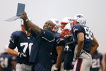 FOXBORO, MA - JULY 24:  Defensive Line Coach Pepper Johnson of the New England Patriots provides instruction in a drill during the first day of training camp at Gillette Stadium on July 24, 2008 in Foxboro, Massachusetts.  (Photo by Jim Rogash/Getty Images)