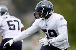 RENTON, WA - MAY 2:  Aaron Curry #59 of the Seattle Seahawks runs drills during minicamp at the Seahawks training facility on May 2, 2009 in Renton, Washington. (Photo by Otto Greule Jr/Getty Images) 