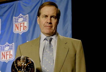 HOUSTON - JANUARY 30:  New England Patriots head coach Bill Belichick poses with the Vince Lombardi trophy after a press conference on January 30, 2004 at the Hilton Hotel in Houston, Texas. (Photo by Jeff Gross/Getty Images)
