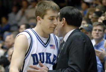 DURHAM, NC - FEBRUARY 07:  Coach Mike Krzyzewski (R) consoles Greg Paulus #3 of the Duke University Blue Devils after Paulus fouled out against the North Carolina Tar Heels during their game on February 7, 2007 at Cameron Indoor Stadium in Durham, North Carolina.  North Carolina defeated Duke, 79-73.  (Photo by Grant Halverson/Getty Images)