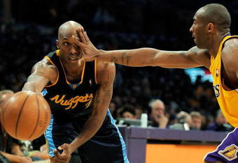 LOS ANGELES, CA - APRIL 09:  Chauncey Billups #7 of the Denver Nuggets has his vision blocked by Kobe Bryant #24 of the Los Angeles Lakers at Staples Center on April 9, 2009 in Los Angeles , California.   (Photo by Kevork Djansezian/Getty Images) NOTE TO USER: User expressly acknowledges and agrees that, by downloading and/or using this Photograph, user is consenting to the terms and conditions of the Getty Images License Agreement. 