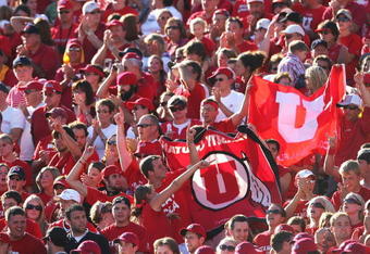 PASADENA, CA - SEPTEMBER 02:  Fans of the Utah Utes cheer during the college football game against the UCLA Bruins held on Septemeber 2, 2006 at the Rose Bowl in Pasadena, California.  (Photo by Jeff Gross/Getty Images)