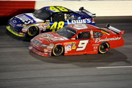 DARLINGTON, SC - MAY 09:  Jimmie Johnson, driver of the #48 Lowe's Chevrolet, races Kasey Kahne, driver of the #9 Budweiser Dodge, during the NASCAR Sprint Cup Series Southern 500 on May 9, 2009 at Darlington Raceway in Darlington, South Carolina.  (Photo by John Harrelson/Getty Images)