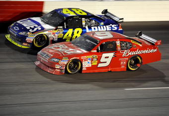 DARLINGTON, SC - MAY 09:  Jimmie Johnson, driver of the #48 Lowe's Chevrolet, races Kasey Kahne, driver of the #9 Budweiser Dodge, during the NASCAR Sprint Cup Series Southern 500 on May 9, 2009 at Darlington Raceway in Darlington, South Carolina.  (Photo by John Harrelson/Getty Images)