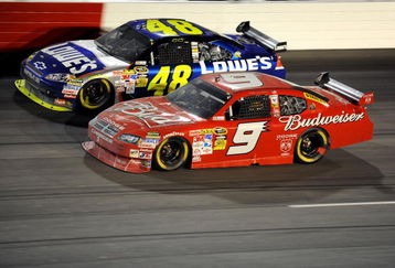 DARLINGTON, SC - MAY 09:  Jimmie Johnson, driver of the #48 Lowe's Chevrolet, races Kasey Kahne, driver of the #9 Budweiser Dodge, during the NASCAR Sprint Cup Series Southern 500 on May 9, 2009 at Darlington Raceway in Darlington, South Carolina.  (Photo by John Harrelson/Getty Images)