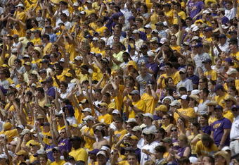 NEW ORLEANS, LA - SEPTEMBER 25: Louisiana State University fans cheer against Mississippi State University during their football game on Saturday September 25, 2004, at the Tiger Stadium in Baton Rouge, Louisiana. Louisiana State defeated Mississippi State 51-0. (Photo by Chris Graythen/Getty Images)