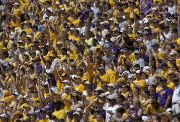 NEW ORLEANS, LA - SEPTEMBER 25: Louisiana State University fans cheer against Mississippi State University during their football game on Saturday September 25, 2004, at the Tiger Stadium in Baton Rouge, Louisiana. Louisiana State defeated Mississippi State 51-0. (Photo by Chris Graythen/Getty Images)