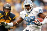 CHARLOTTE, NC - DECEMBER 27:  Hakeem Nicks #88 of the North Carolina Tar Heels runs with the ball against the West Virginia Mountaineers during the Meineke Car Care Bowl on December 27, 2008 at Bank of America Stadium in Charlotte, North Carolina.  (Photo by Streeter Lecka/Getty Images)