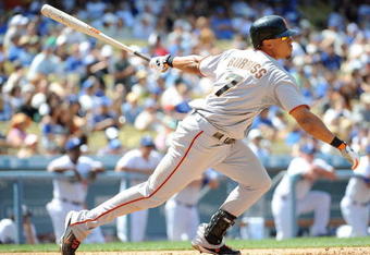 LOS ANGELES, CA - MAY 09:  Emmanuel Burriss #7 of the San Francisco Giants watches his hit against the Los Angeles Dodgers at Dodger Stadium on May 9, 2009 in Los Angeles, California.  (Photo by Harry How/Getty Images)