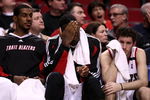 PORTLAND, OR - APRIL 18:  LaMarcus Aldridge (L) #12, Greg Oden (C) #52 and Rudy Fernandez (R) #5 of the Portland Trail Blazers watch the game from the bench against the Houston Rockets during Game 1 of the Western Conference Quarterfinals of the NBA Playoffs on April 18, 2009 at the Rose Garden in Portland, Oregon. NOTE TO USER: User expressly acknowledges and agrees that, by downloading and or using this Photograph, user is consenting to the terms and conditions of the Getty Images License Agreement.  (Photo by Jonathan Ferrey/Getty Images)
