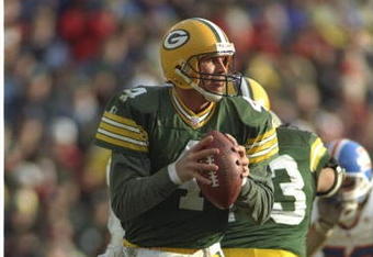 8 Dec 1996:  Quarterback Brett Favre of the Green Bay Packers looks to pass the ball during a game against the Denver Broncos at Lambeau Field in Green Bay, Wisconsin.  The Packers won the game 41-6. Mandatory Credit: Brian Bahr/Allsport