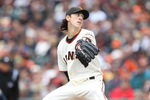 SAN FRANCISCO - APRIL 07:  Tim Lincecum #55 of the San Francisco Giants pitches against the Milwaukee Brewers during Opening Day of the Major League Baseball season on April 7, 2009 at AT&T Park in San Francisco, California.  (Photo by Jed Jacobsohn/Getty Images)