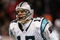 CHICAGO - JANUARY 15:  Quarterback Jake Delhomme #17 of the Carolina Panthers celebrates a touchdown agaisnt the Chicago Bears in the NFC Divisional playoff game at Soldier Field on January 15, 2006 in Chicago, Illinois.  (Photo by Nick Laham/Getty Images)